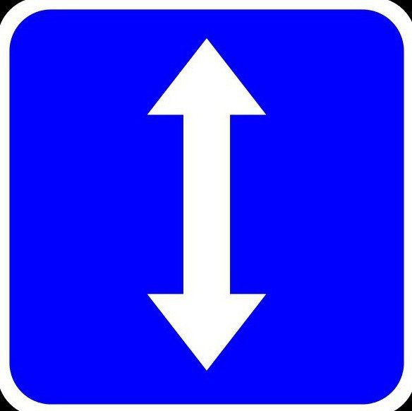 Дорожный знак стрелка вниз на синем фоне