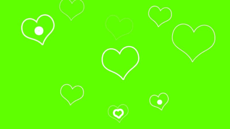 Белое сердечко на зеленом фоне