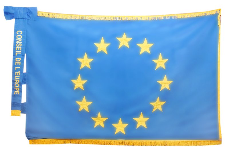 Флаг с желтыми звездами на белом фоне