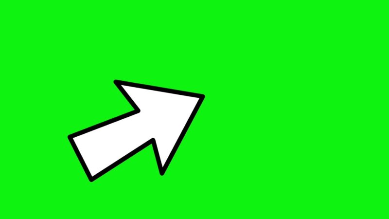 Компьютерная стрелка на зеленом фоне