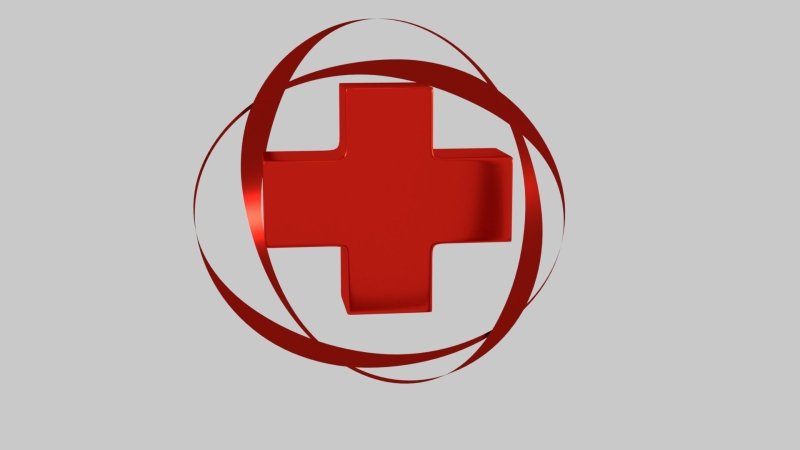 Красный медицинский крест на синем фоне