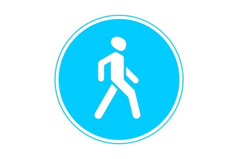 Круглый знак пешеход на синем фоне