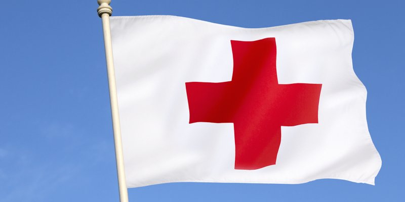 Медицинский флаг с красным крестом на белом фоне